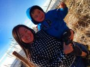 Young native woman and son